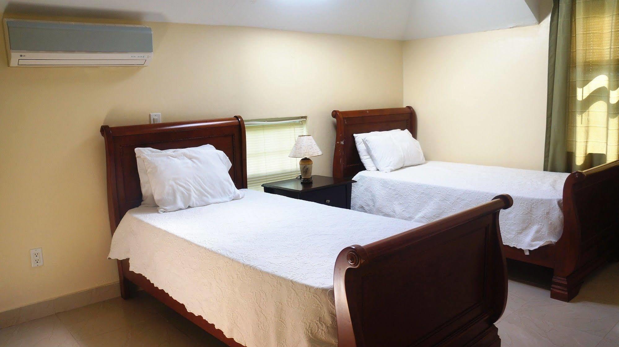 Carib Club Apartment Teluk Grace Luaran gambar